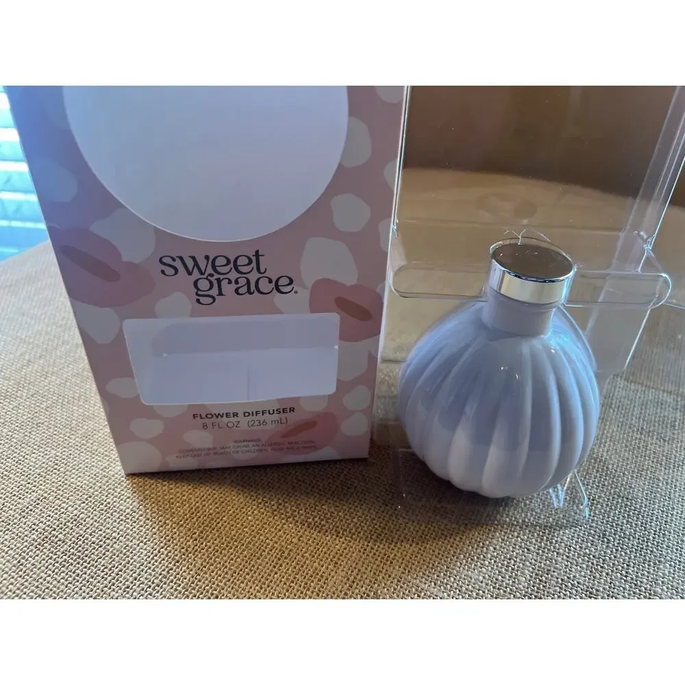 Sweet Grace Diffuser Oil in white vase only. No flower.